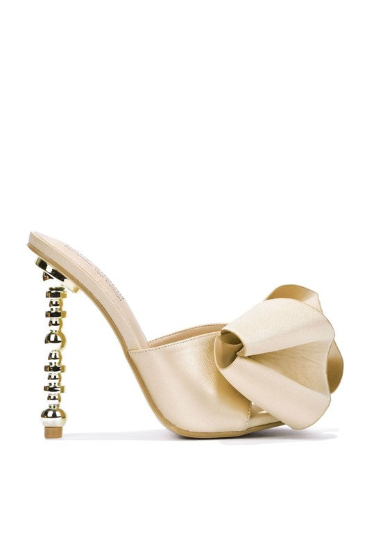 Tip Toeing in Bows Shoes