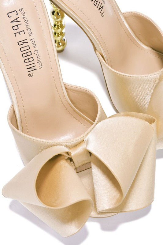 Tip Toeing in Bows Shoes