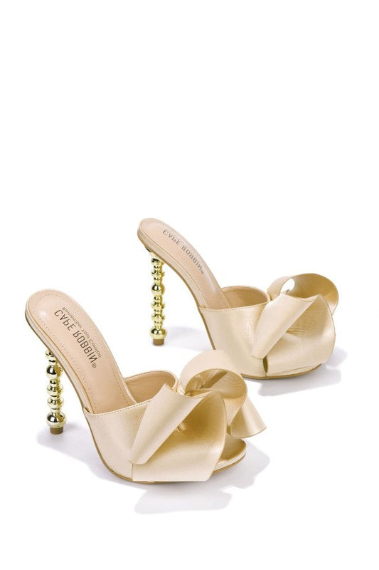 Tip Toeing in Bows Shoes